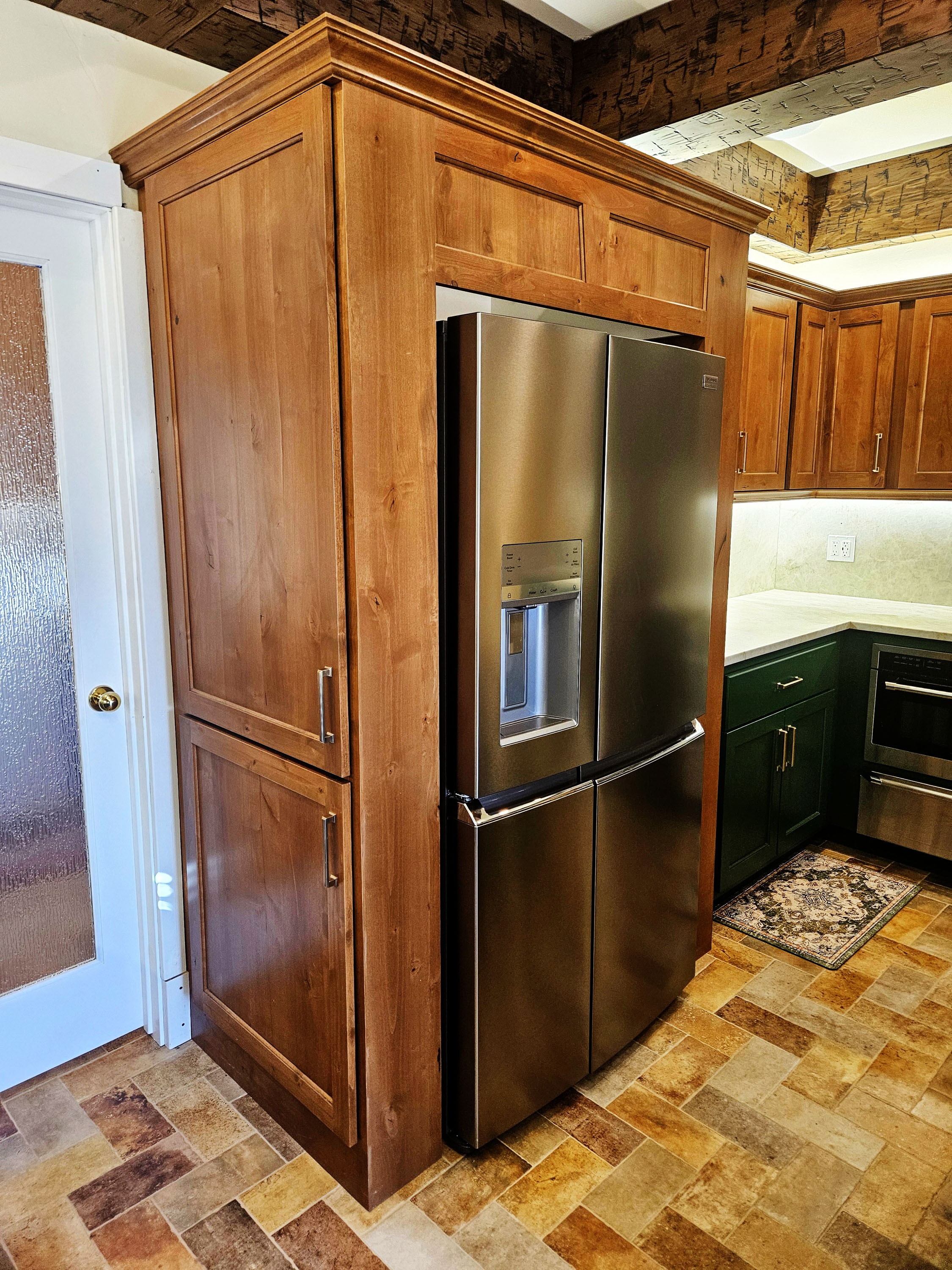 Custom kitchen cabinetry with detailed storage